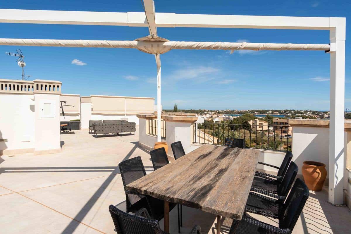 Luxurious 3-Bedroom Apartment in Idyllic Portocolom Community with Rooftop & Pool